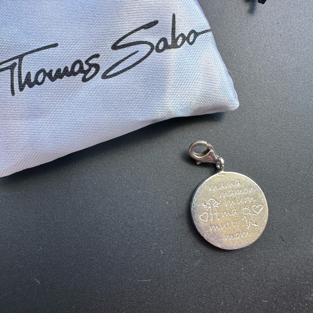 EUC Thomas Sabo “Mama” in multi-languages Charm, Sterling silver